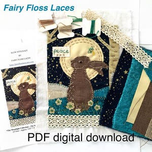 May include: A slow stitch kit by Fairy Floss Laces, featuring a brown rabbit against a starry night sky. The kit includes spools of thread, lace trim, and fabric patches. Text on the image reads "peace" and "PDF digital download."