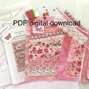 May include: A selection of pink and white fabrics, lace, embroidery thread, and printed patterns. The text "PDF digital download" is visible. The fabrics display floral designs, butterflies, and a bird motif. The kit includes a "Slow Stitch Kit" by Fairy Floss Laces.