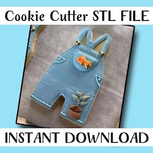 May include: A light blue cookie in the shape of overalls, decorated with a goldfish and a potted plant. The cookie has gold accents and the text "Cookie Cutter STL FILE" and "INSTANT DOWNLOAD".