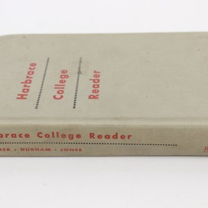 May include: A tan-colored book with the title "Harbrace College Reader" in red lettering. The author names "Schorer, Durham, Jones" are printed below the title. The book is published by Harcourt, Brace & Co.