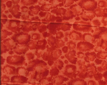 Orangefarbener Batik Baumwollstoff mit Grafikdruck / Fat Quarter 48 x 61 cm