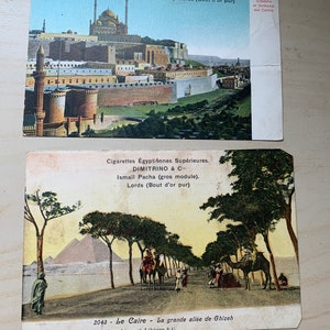 Lot of two old colorized postcards, advertising for the superior Egyptian cigarettes DIMITRINO & Cie 1910