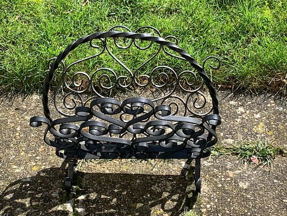 Black wrought iron magazine rack, vintage arabesque patterns 1950/1960