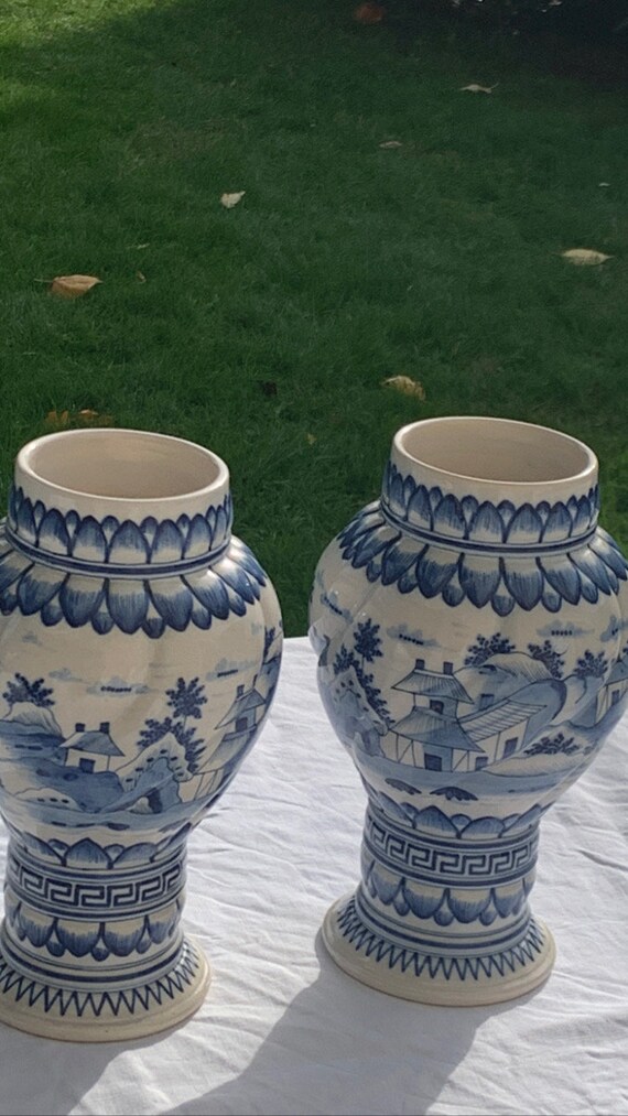 Magnificent pair of delft earthenware vases. Signed and numbered