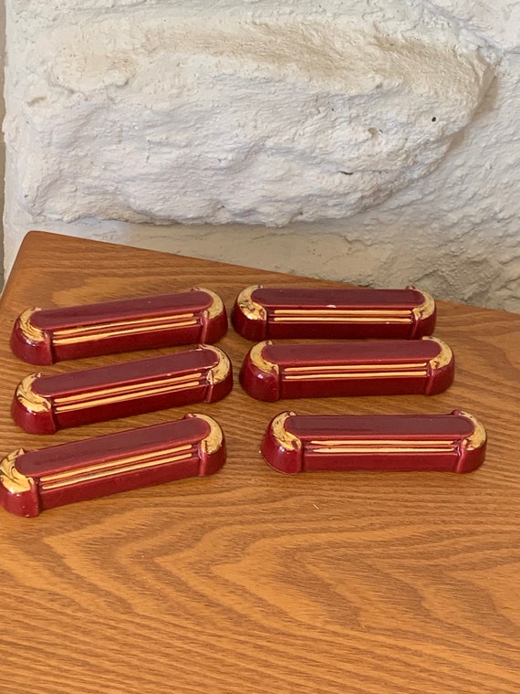 knife holders in burgundy enamelled ceramic and gold piping in ART DECO style