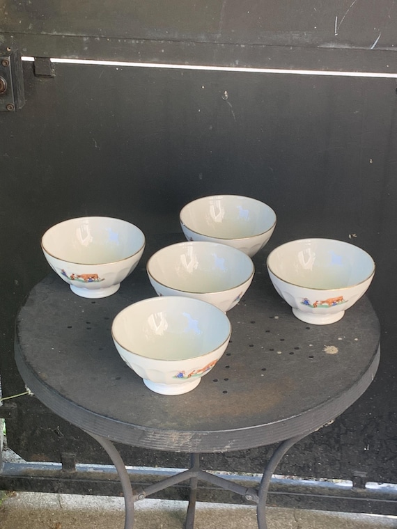 Set of 5 antique faceted white earthenware bowls with naive decoration