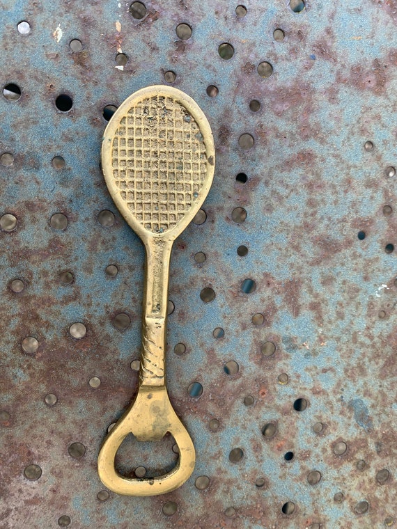 Bottle opener, golden brass bottle opener in the shape of a vintage tennis racket