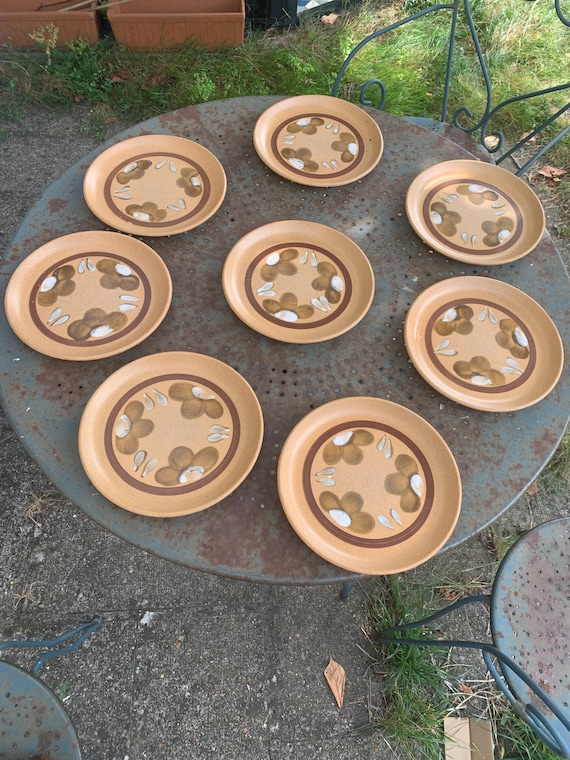 8 vintage Sarreguemines stoneware flower-patterned dinner plates from France