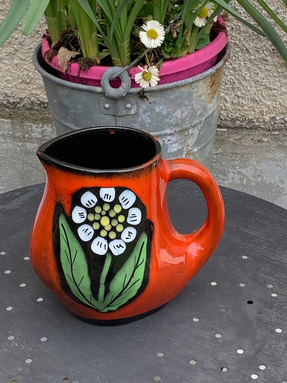 Pretty orange enameled ceramic carafe, stamped, BRESSE, with a vintage flower 1970