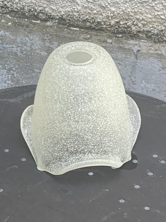 White frosted glass globe with an antique speckled effect