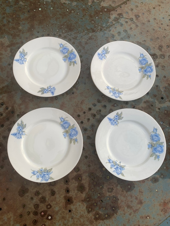 4 petites assiettes en porcelaines frises de roses bleus, art deco