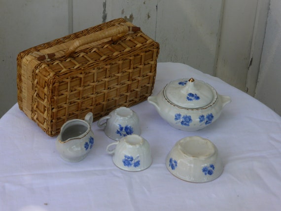 Charming old dinette for porcelain dolls, blue flowers patterns, art deco with a vintage bamboo and wicker basket