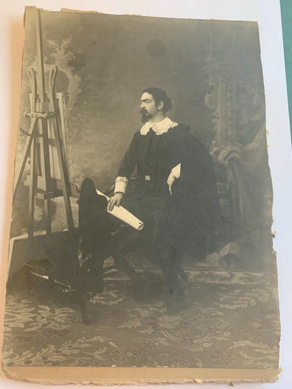 Old photograph, the painter in front of his canvas