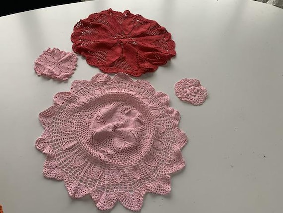 set of 4 crochet doilies, handmade, artisanal, 3 pinks and one vintage red