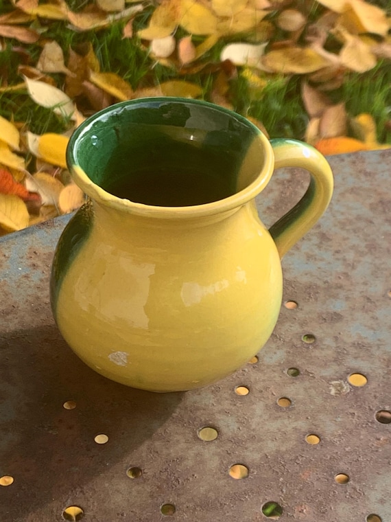 Milk jug in enameled ceramic, two-tone yellow and green vintage 1950
