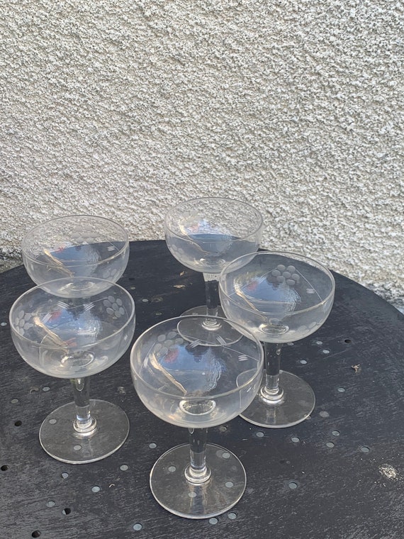 5 champagne glasses in transparent glass with chiseled flowers, vintage