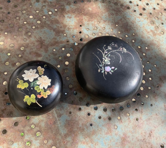 Two black jewelry boxes in black lacquer, mother-of-pearl inlay and hand painted, vintage floral pattern