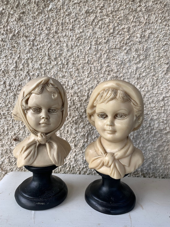 Pair of resin statuettes, vintage children