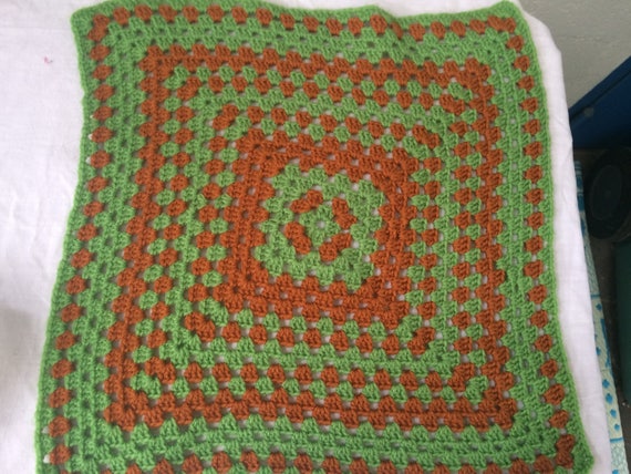 Crochet doily in wool, green and brown, base for making a vintage 1970 cushion, granny square