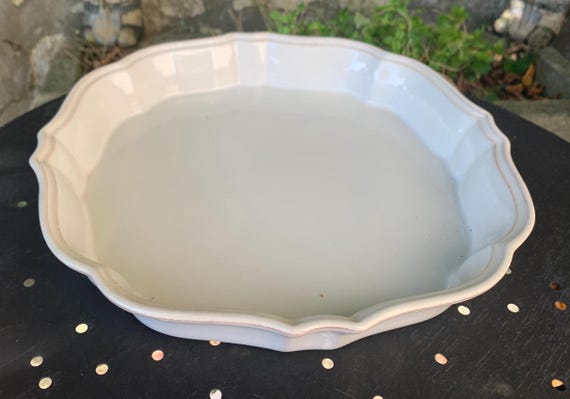 White glazed ceramic pie dish
