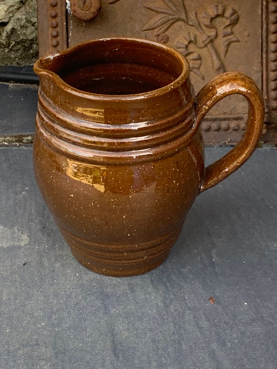 Glazed stoneware pitcher, old cider jug