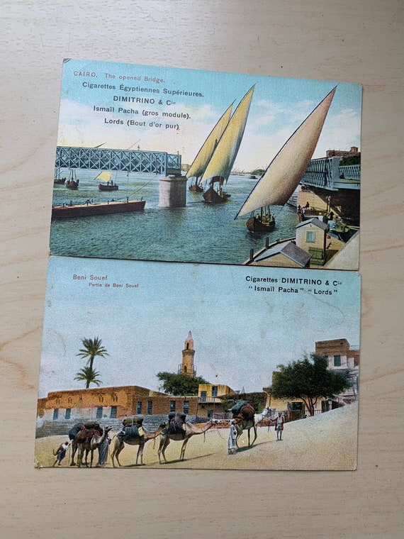 Lot of two old colorized postcards, advertising for the superior Egyptian cigarettes DIMITRINO & Cie 1910