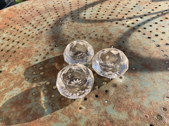 Set of three salt pots in faceted cut glass, transparent glass