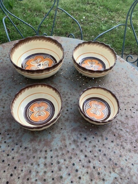 4 nesting salad bowls in enameled ceramic MBFA, pornic, Pont l'Abbé decorated with vintage hand.