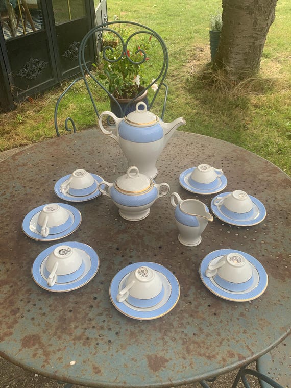 Charming tea or coffee set, consisting of 17 pieces, Made in France, earthenware, signed Poreylor l'Amandinoise, vintage et collector