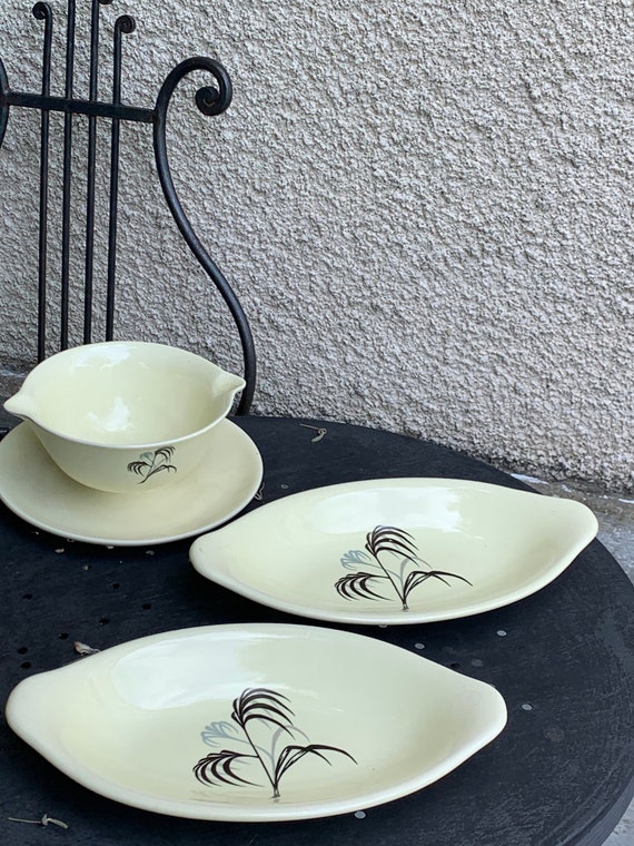 Two small serving dishes and a Las Palmas model sauce boat in fine vintage France salins earthenware.