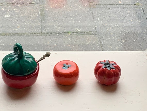 Salt pots and mustard pot, in enameled ceramic, barbotine, in the shape of a tomato, vintage