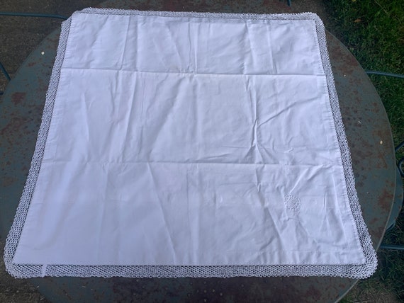 Large pillowcase, white cotton, lined with lace and monogrammed, closed with mother-of-pearl buttons on the back, art deco