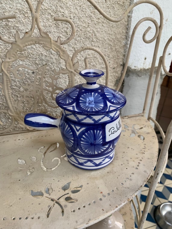 Carafe with blue and gold foliage pattern, in vintage transparent glass