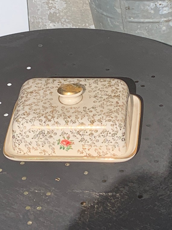 Villeroy and Boch earthenware butter dish, Made in France Saar, Economic Union, decorated with gold flowers and roses, old,