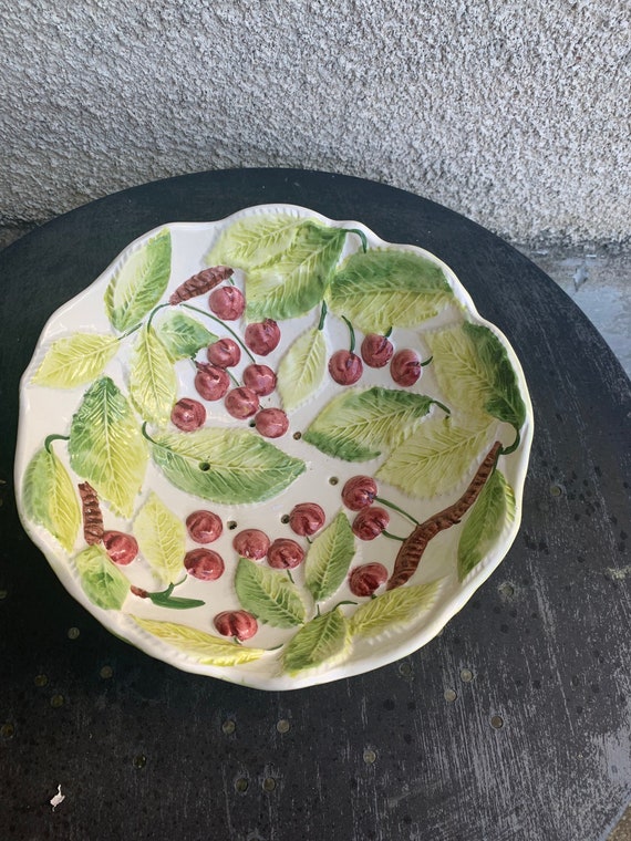 Magnificent salad bowl, enameled ceramic barbotine drainer, cherry and foliage pattern, vintage