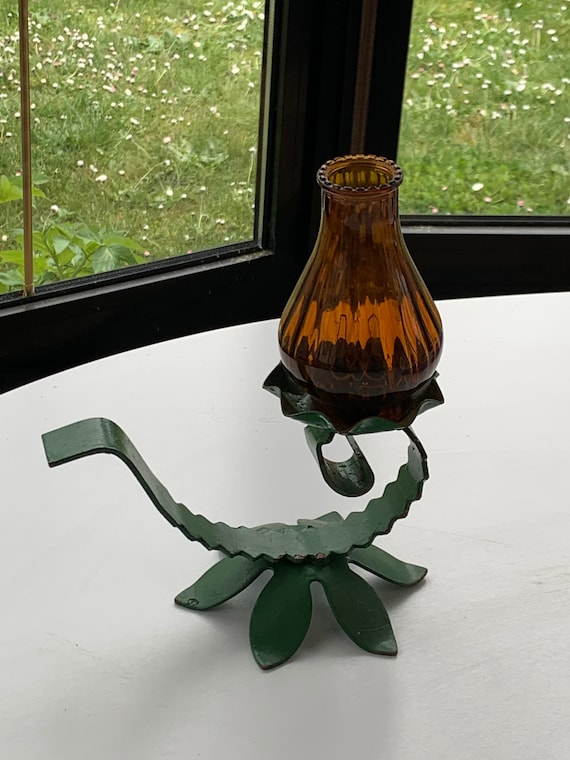 Candlestick in the shape of flowers with a green metal base in the shape of a stem and leaves vintage 1970