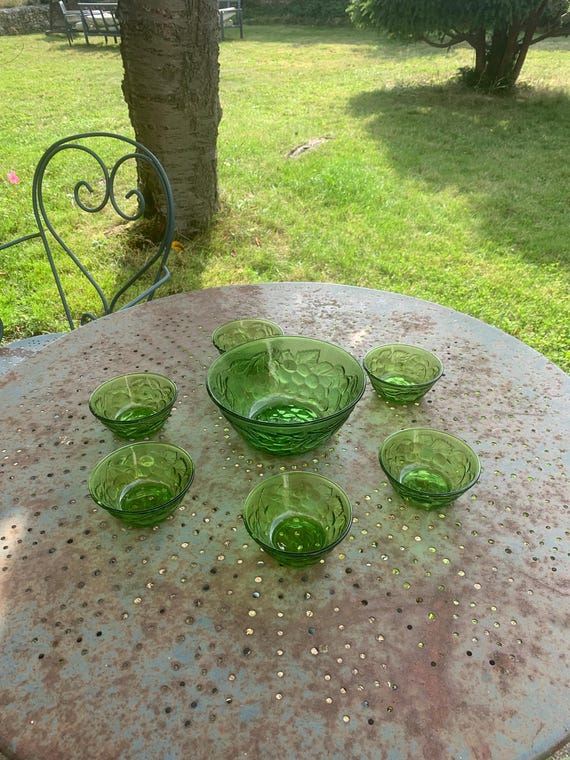 Green glass salad bowl with relief cherry pattern, vintage 1970