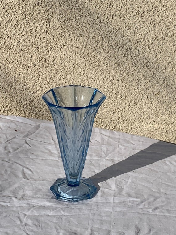 Large blue glass vase with embossed patterns, art deco