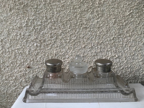 Old transparent glass inkwell, 3 compartments with pewter and full glass corks, pen holder in front, art deco