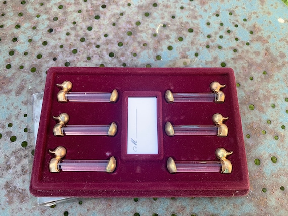 6 knife holders in glass and metal gilded with 24-carat fine gold, place marks, in their original box made in France