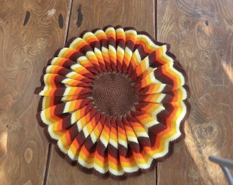 Crochet wool placemat, artisanal, made in France, vintage 1970 in brown, yellow, orange and edge colors