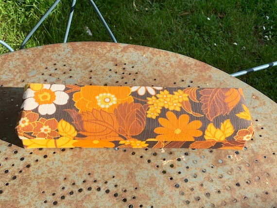 Large cardboard box covered in fabric with large orange flowers vintage 1970