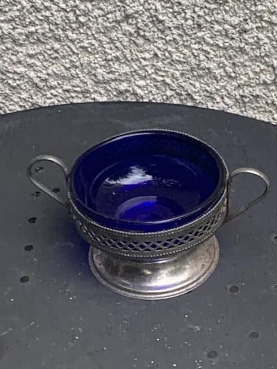 Blue glass and vintage silver stainless steel jam jar