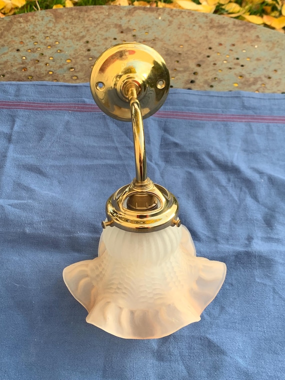Wall light, art deco style, beige and white frosted glass globe and vintage gold-colored metal wall light