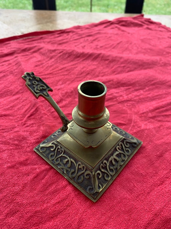 Superb vintage chiseled brass thumb candlestick