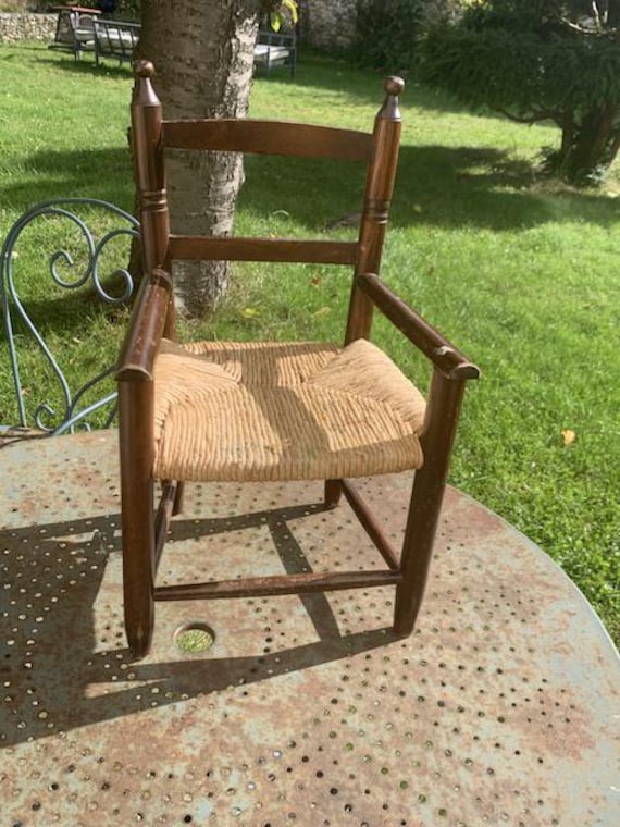 Small children's chair in vintage wood and straw