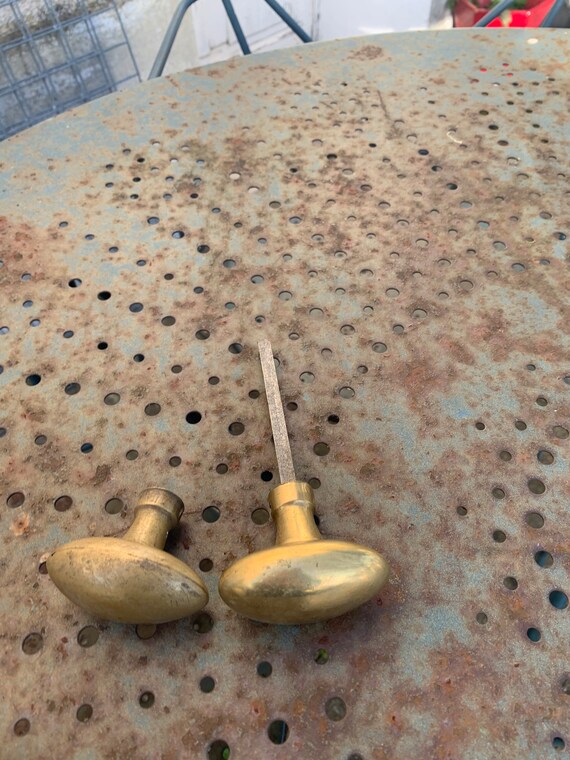 Two copper door handles, gilded brass, old art deco