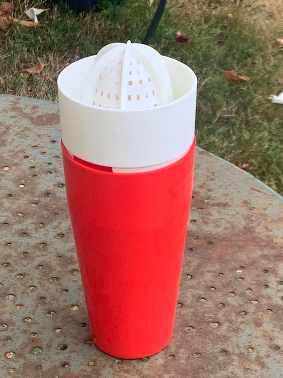 Vintage 1970’sred and white plastic lemon squeezer