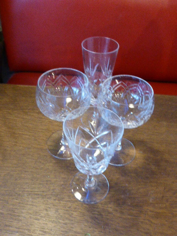 Set of 4 chiseled glasses, mismatched in vintage crystal glass