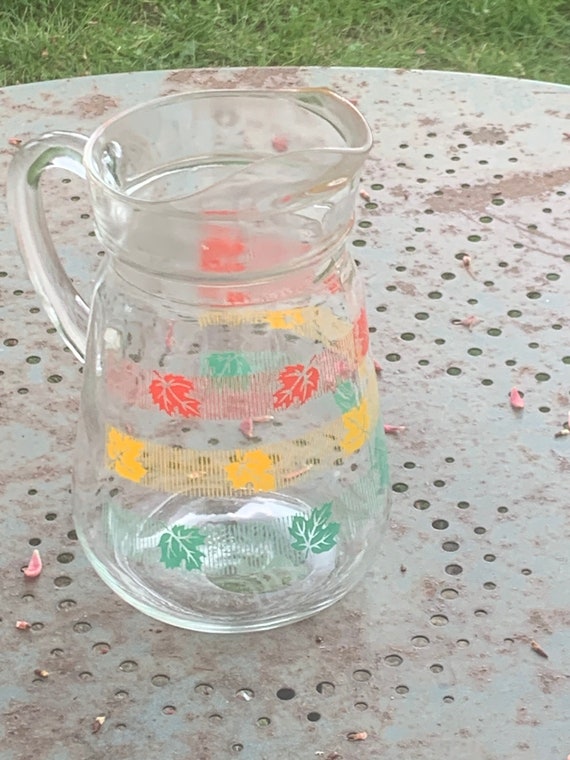 Jug, carafe with green, yellow and red silkscreened leaves, vintage 1970